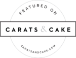 Circular logo with the words Featured on CARATS & CAKE in the center, telling you all about elegance. The outer circle includes the website CARATSANDCAKE.COM at the bottom.